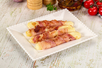 Hot mozzarella sticks with bacon