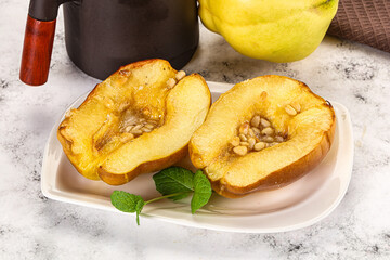 Baked quince with honey and cedar