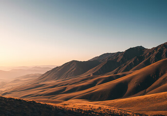 Naklejka premium Golden Hour Panorama Mountain Landscape at Sunset
