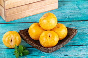 Raw ripe sweet yellow plums