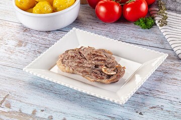 Grilled lamb steak with bone