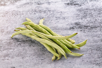 Raw green string beans heap