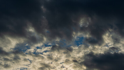Evening clouds on the horizon with a sky background.