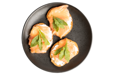 Top view of smoked salmon toasts isolated no background cutout