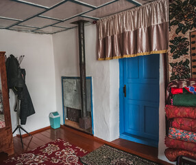 Traditional interior in the house of the Pamir population of the Pamirs in the village of Karakul, a highland settlement