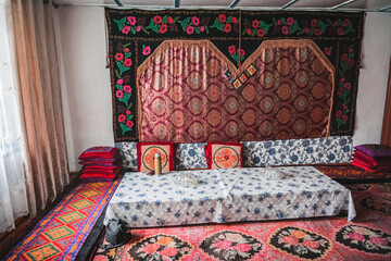 Traditional interior in the house of the Pamir population of the Pamirs in the village of Karakul, a highland settlement