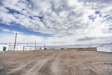 The village of Karakul is highland in the Pamirs in the Tien Shan mountains