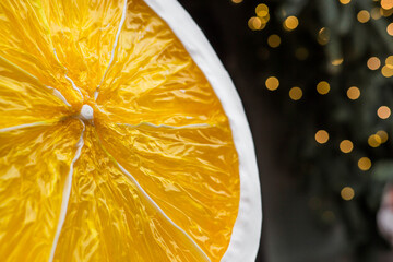 Mandarins in a string bag and Christmas tree decorations on the streets of Moscow. Happy New Year...
