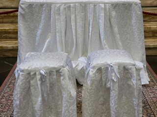 church wedding white chairs detail