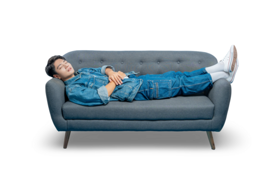 Asian man in casual clothes is sleeping peacefully while lying on a sofa, representing rest and relaxation.PNG