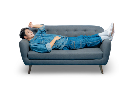 A happy young man gestures upwards while lounging on a sofa, looking relaxed and carefree.
- Powered by Adobe
