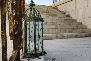Rustic Lantern and Weathered Stone Steps Outdoors