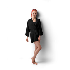 Mockup of a black short silk robe with a belt on a red-haired girl, png, side view