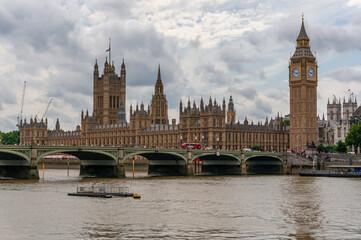 skyline from london uk with big ben westminster hall and the thames river typical English weather