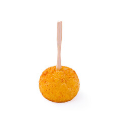 Crispy golden snack ball on a stick ready to be enjoyed at a fair