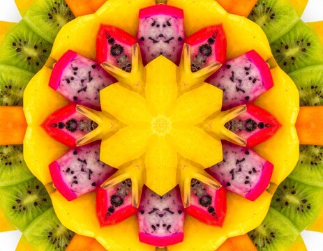 Exotic tropical fruit kaleidoscope pattern with kiwi and dragon fruit for a vibrant, healthy background.