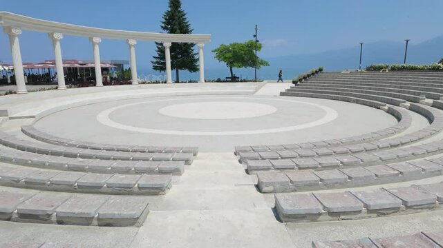 Amphitheater of Pogradec, Albania. - June 12, 2025. The amphitheater is designed to provide spaces for sitting, resting, and recreational and entertainment activities for both children and adults.