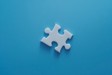 A white puzzle piece is on a blue background. The puzzle piece is missing a corner, and it is the only piece visible. Concept of emptiness and loneliness, as the puzzle piece is incomplete