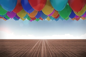 Many colourful balloons sky background