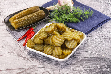 Sliced marinated cucumbers in the bowl