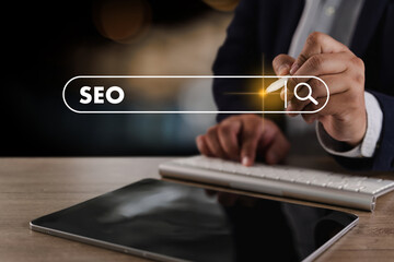 SEO search engine optimization Business person using digital device to search for SEO strategies...