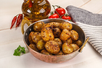 Baked mini potato with herbs