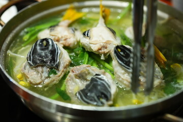 Traditional Korean Puffer Fish Soup (Bokjiri) at Surim Bokguk Restaurant in Seoul