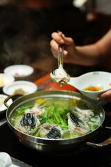 Traditional Korean Puffer Fish Soup (Bokjiri) at Surim Bokguk Restaurant in Seoul