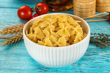 Raw dry farfalle for cooking