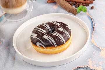 Delicous sweet donut with chocolate glaze