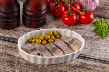 Slided marinated salted herring fillet