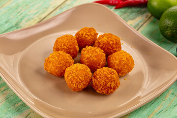 Fried crispy yellow cheese balls