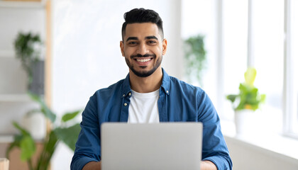 Fototapeta premium Diverse Young Male Professional Working Remotely at Home