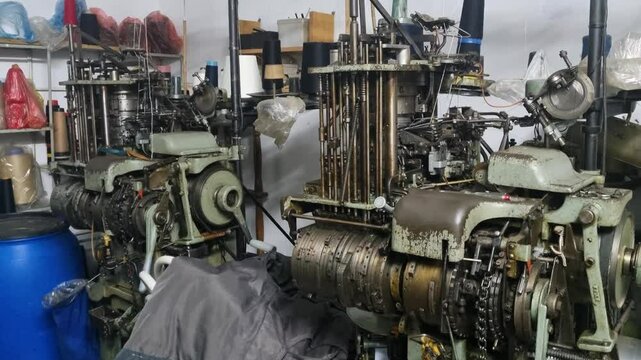 A long-forgotten 1950s sock knitting machine, once vital to Yugoslavia&rsquo;s textile industry, stands quietly, waiting to be brought back to life