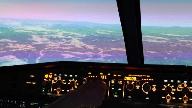 In-cockpit view of Airbus A320 flight deck - pilot adjusting throttle and controls in realistic flight simulator, clear instrument panel and sky view.