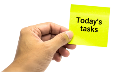 A hand holding a sticky note with "Today's tasks" written on it. Focus is on the task at hand. It's a reminder to be productive