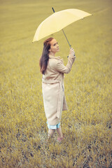 Young girl in autumn park