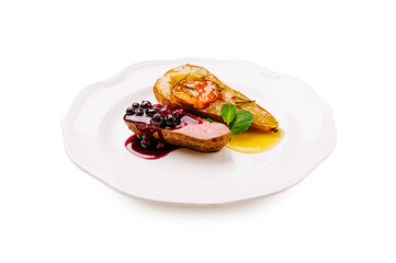 Exquisite roasted duck breast served with fruit and berry sauce