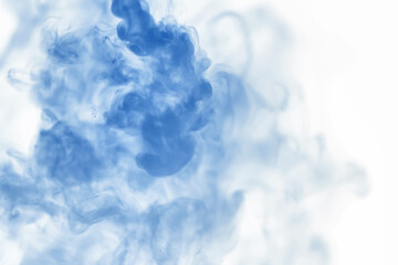 Puffs of paint in water. The dissolution of the dye in water. Water pollution. Concept art creativity.