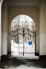 old forged gate. fragment of the pattern of metal. rusty metal. Metal grill from rusty plates