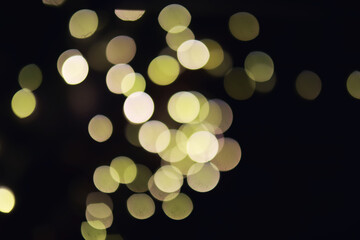 Abstract bokeh background. Golden bokeh circles on dark blue background. Layer overlay.
