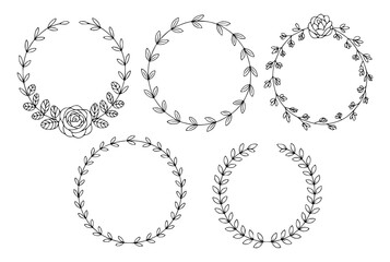 Fototapeta premium Delicate hand-drawn floral wreaths and frames for wedding and decorative designs