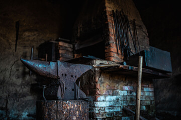 Anvil and furnace in an old blacksmith's shop