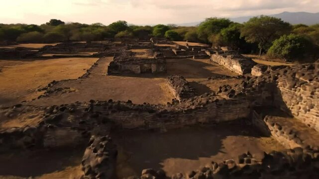 An aerial view shows the ancient ruins of ihuatzio, a prehispanic archaeological site in michoacan, mexico, with round pyramids and stone buildings