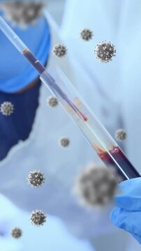 Animation of floating macro Covid-19 cells over doctor taking sample and wearing medical gloves