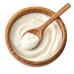 Top-down view of wooden bowl with creamy white yogurt or sauce and wooden spoon isolated on transparent background