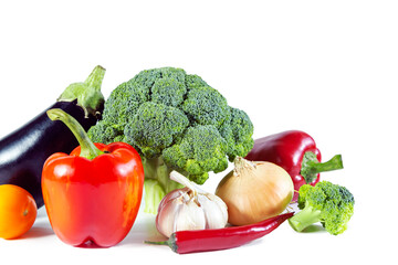 Fresh shiny multicolored vegetables isolated on white background.