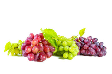 Bunches of green and red juicy grapes with leaves isolated on white.