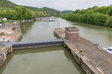 River cruise ship approaching the locks of Amfreville-sou-les-Monts on the Seine near Rouen