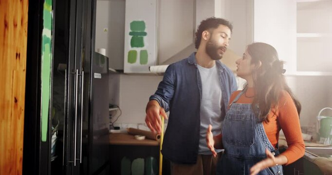 Painting, couple and argument in home with fight, color problem or frustrated with diy challenge. Renovation, man and woman with conflict for remodeling kitchen, marriage crisis and angry with stress